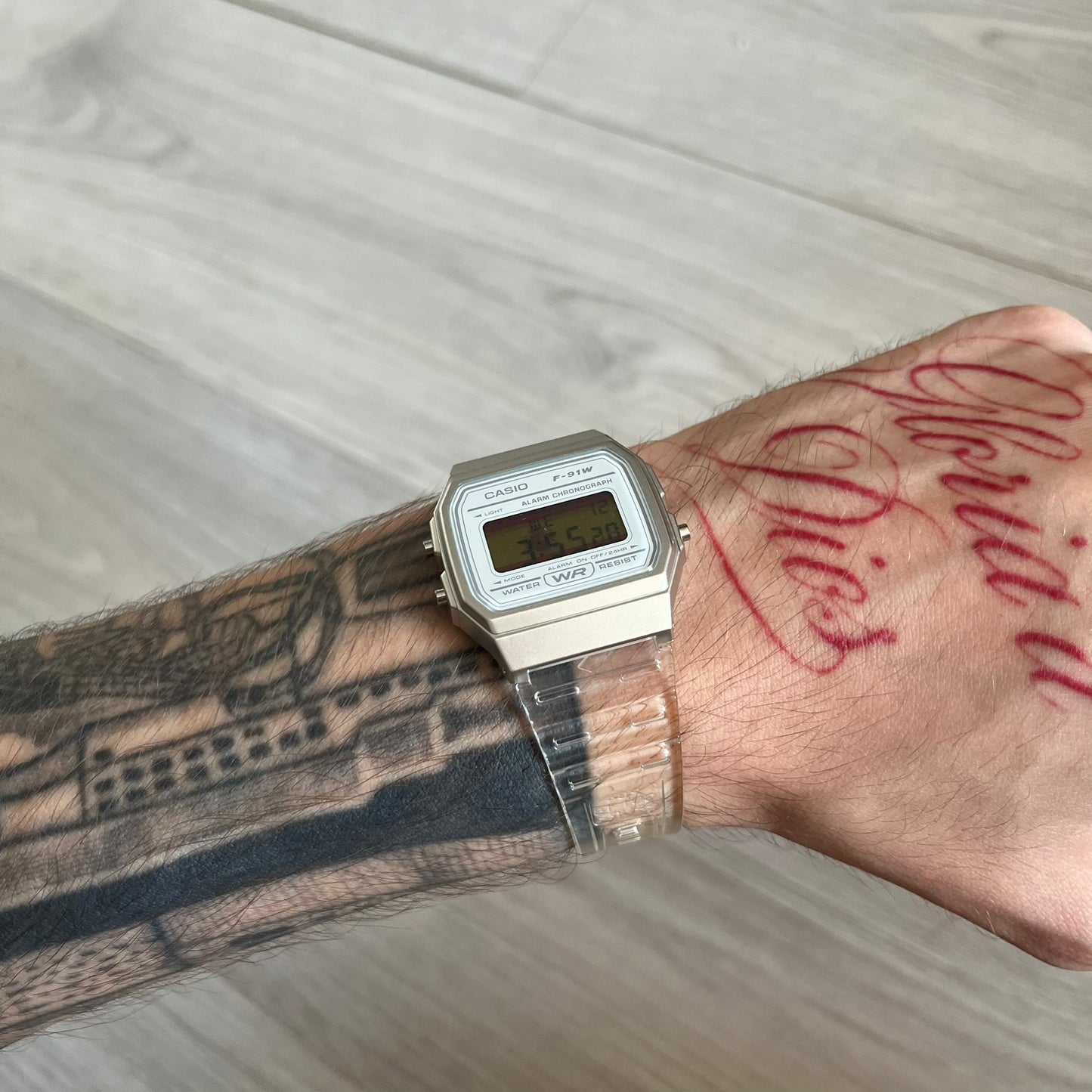 Custom Casio F-91W Clear/Transparent digital watch featuring a Spanish Flag filter screen. Slim 8.5 mm profile, lightweight 21 g build and flexible bio-based resin band ensure lasting comfort. Includes alarm, stopwatch, and microlight function for everyday functionality.