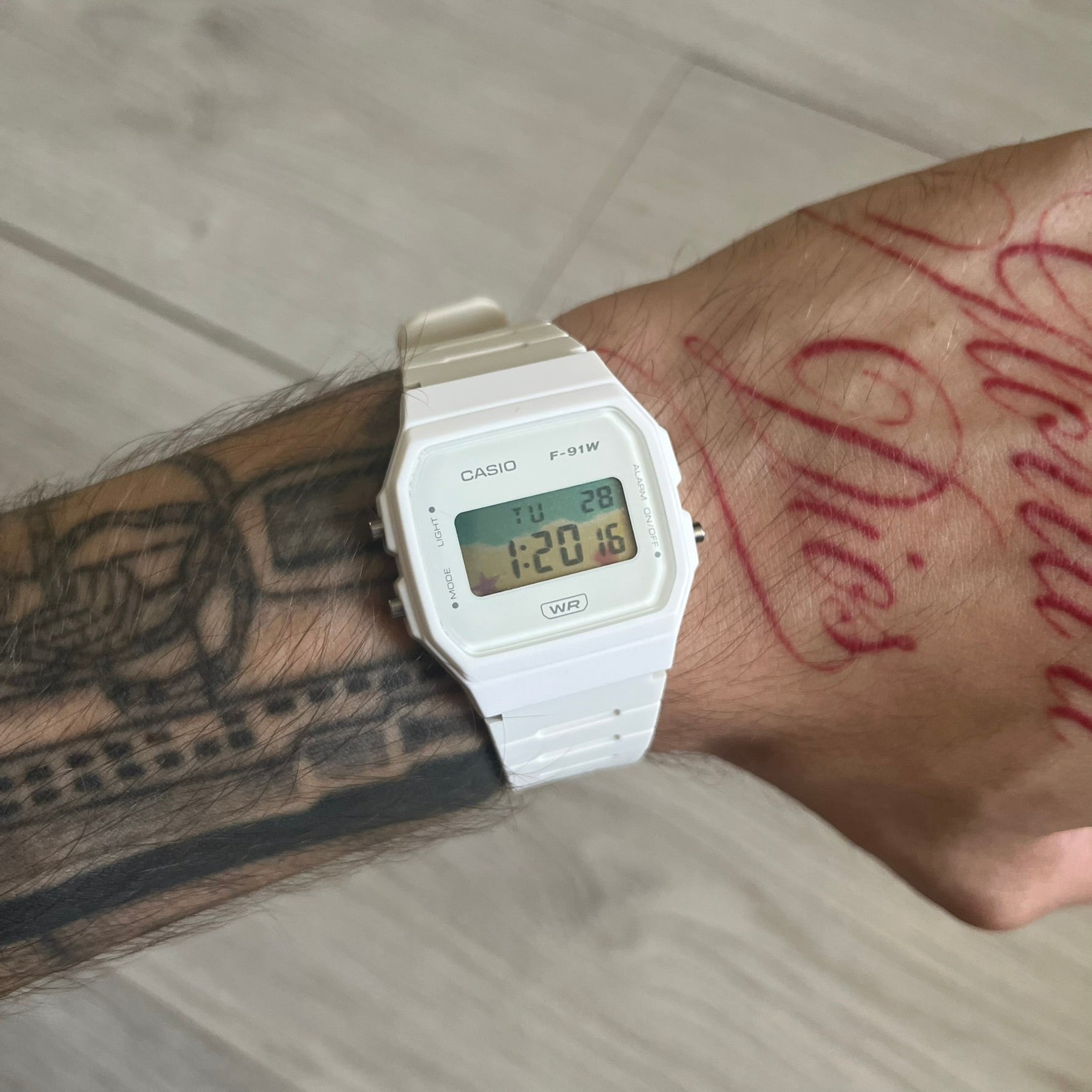 Custom Casio F-91W White digital watch featuring a Sandy beach filter screen. Slim 8.5 mm profile, lightweight 21 g build and flexible bio-based resin band ensure lasting comfort. Includes alarm, stopwatch, and microlight function for everyday functionality.
