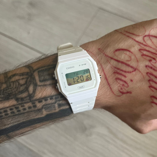 Custom Casio F-91W White digital watch featuring a Sandy beach filter screen. Slim 8.5 mm profile, lightweight 21 g build and flexible bio-based resin band ensure lasting comfort. Includes alarm, stopwatch, and microlight function for everyday functionality.