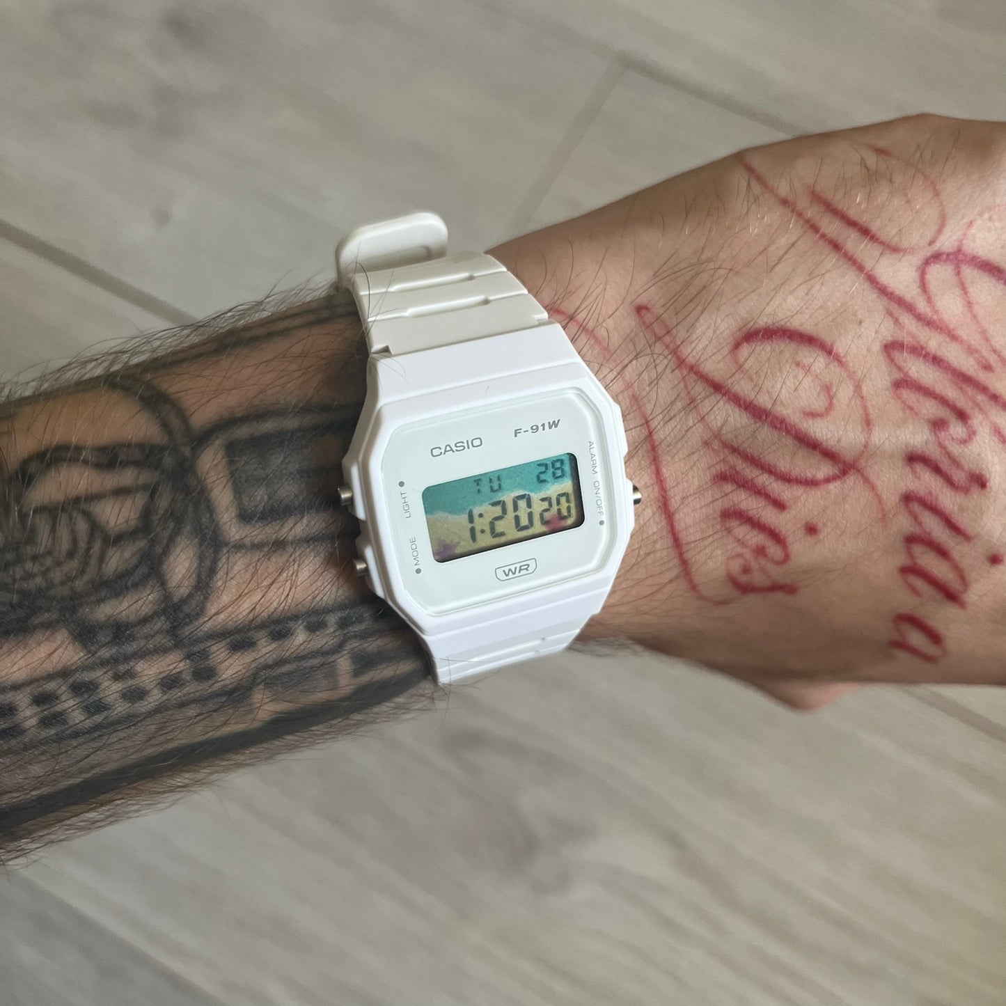 Custom Casio F-91W White digital watch featuring a Sandy beach filter screen. Slim 8.5 mm profile, lightweight 21 g build and flexible bio-based resin band ensure lasting comfort. Includes alarm, stopwatch, and microlight function for everyday functionality.