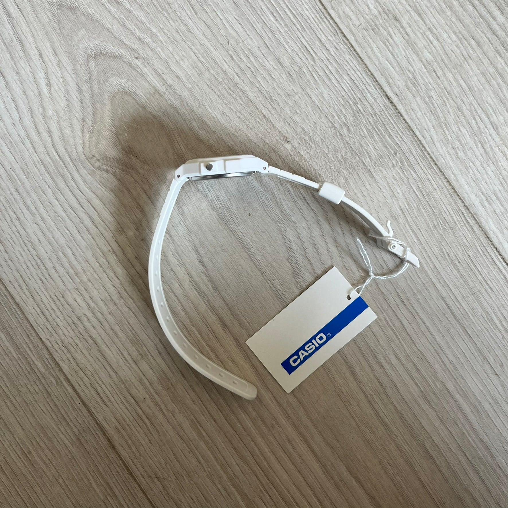 Custom Casio F-91W White digital watch featuring a Sandy beach filter screen. Slim 8.5 mm profile, lightweight 21 g build and flexible bio-based resin band ensure lasting comfort. Includes alarm, stopwatch, and microlight function for everyday functionality.