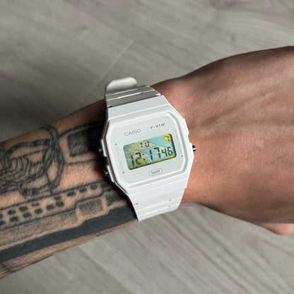 Custom Casio F-91W White digital watch featuring a Landscape filter screen. Slim 8.5 mm profile, lightweight 21 g build and flexible bio-based resin band ensure lasting comfort. Includes alarm, stopwatch, and microlight function for everyday functionality.