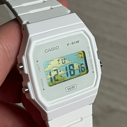 Custom Casio F-91W White digital watch featuring a Landscape filter screen. Slim 8.5 mm profile, lightweight 21 g build and flexible bio-based resin band ensure lasting comfort. Includes alarm, stopwatch, and microlight function for everyday functionality.