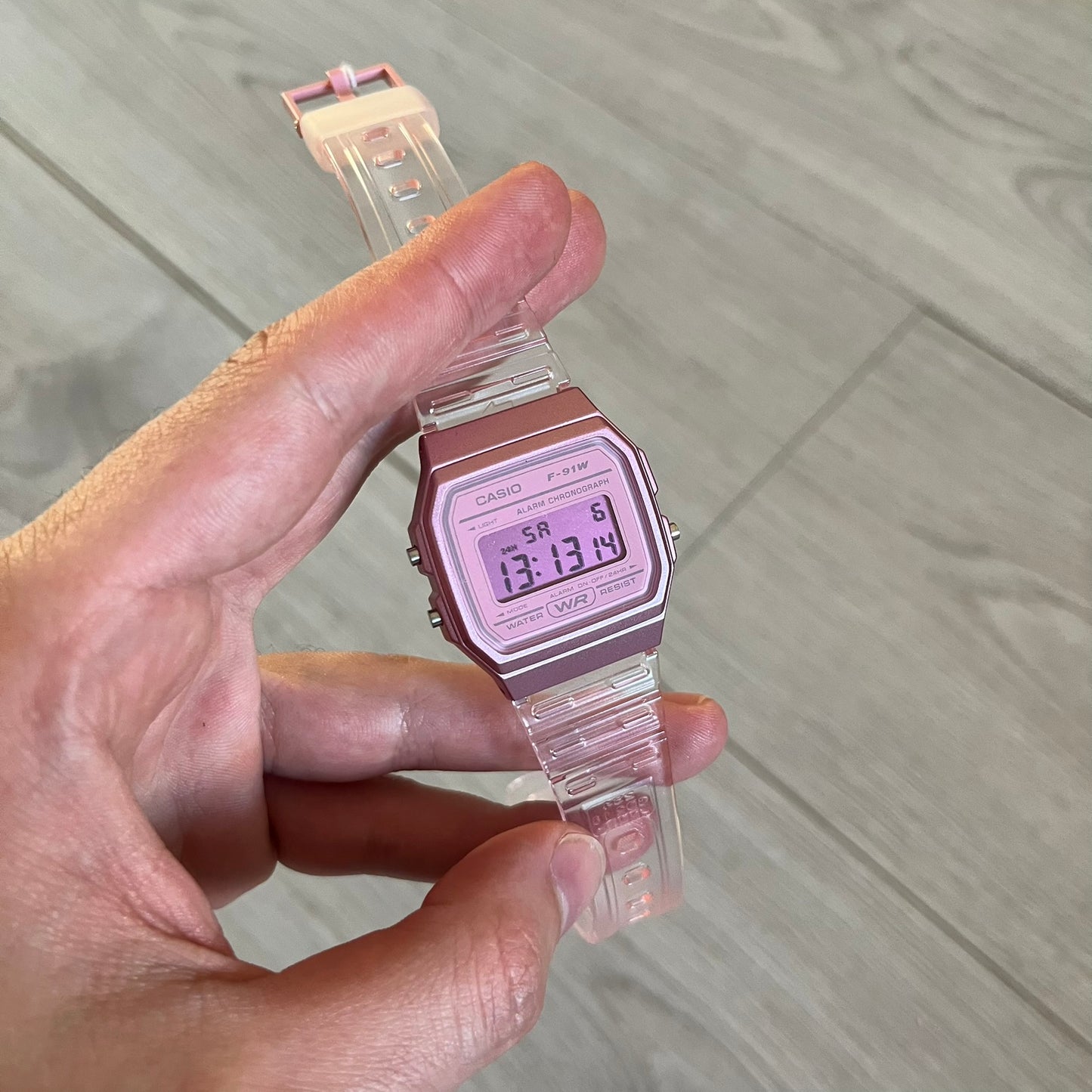 Custom Casio F-91W Pink digital watch featuring a fully Pink filter screen. Slim 8.5 mm profile, lightweight 21 g build and flexible bio-based resin band ensure lasting comfort. Includes alarm, stopwatch, and microlight function for everyday functionality.