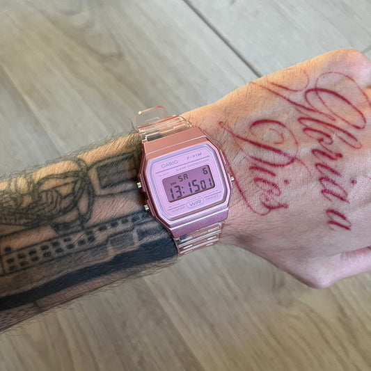 Custom Casio F-91W Pink digital watch featuring a fully Pink filter screen. Slim 8.5 mm profile, lightweight 21 g build and flexible bio-based resin band ensure lasting comfort. Includes alarm, stopwatch, and microlight function for everyday functionality.