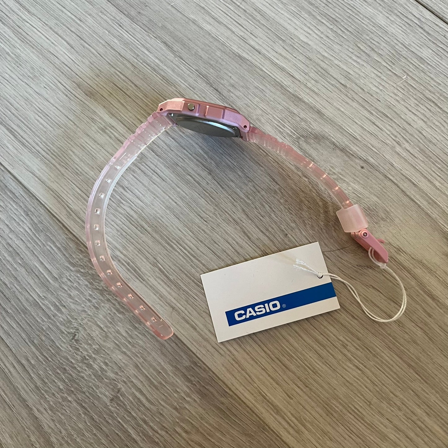 Custom Casio F-91W Pink digital watch featuring a fully Pink filter screen. Slim 8.5 mm profile, lightweight 21 g build and flexible bio-based resin band ensure lasting comfort. Includes alarm, stopwatch, and microlight function for everyday functionality.