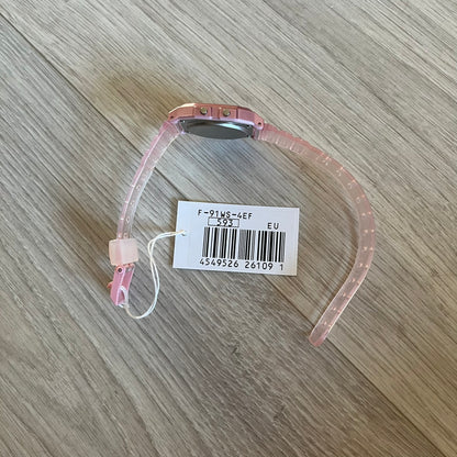 Custom Casio F-91W Pink digital watch featuring a fully Pink filter screen. Slim 8.5 mm profile, lightweight 21 g build and flexible bio-based resin band ensure lasting comfort. Includes alarm, stopwatch, and microlight function for everyday functionality.