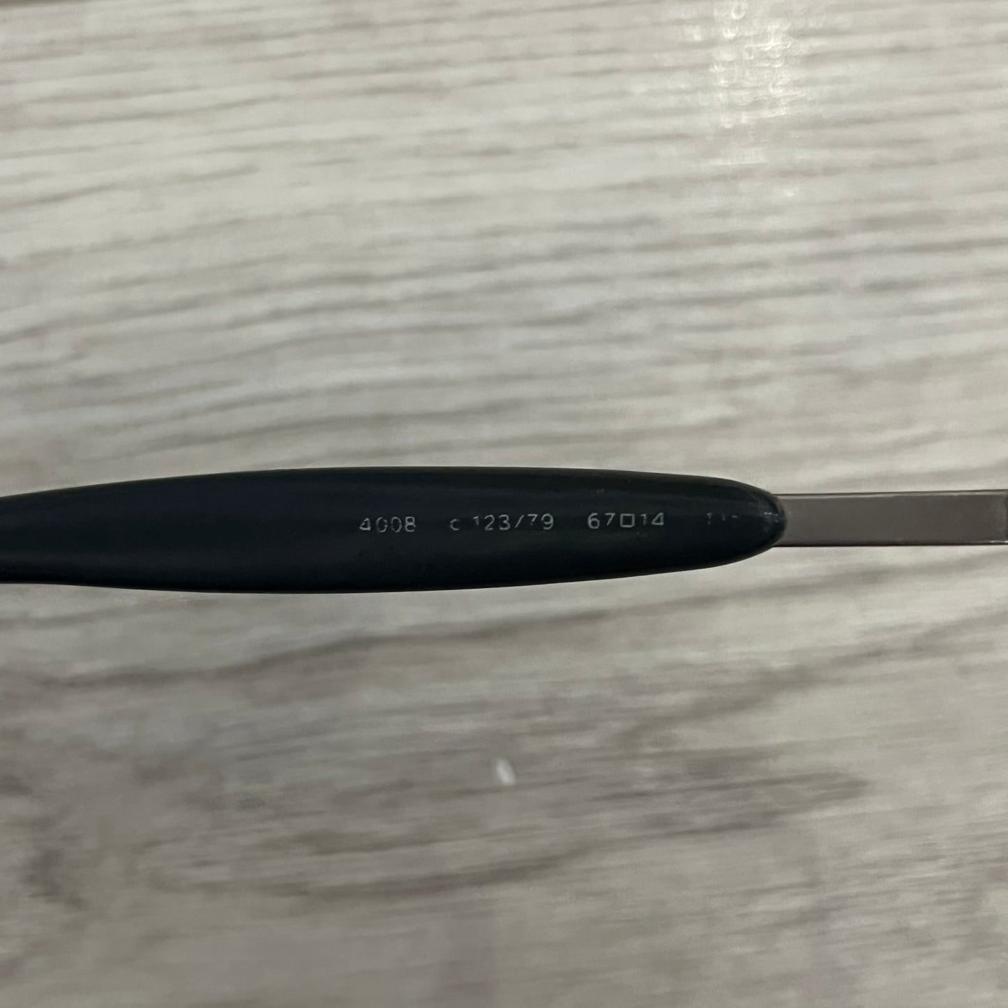 Chanel 4008 Rimless Silver Sunglasses with blue gradient lenses, combining a futuristic rimless design with vintage early 2000s style. Features CC logos on the temples, Chanel engraving on the bridge, and a silver metal frame. Made in Italy with CE certification.
