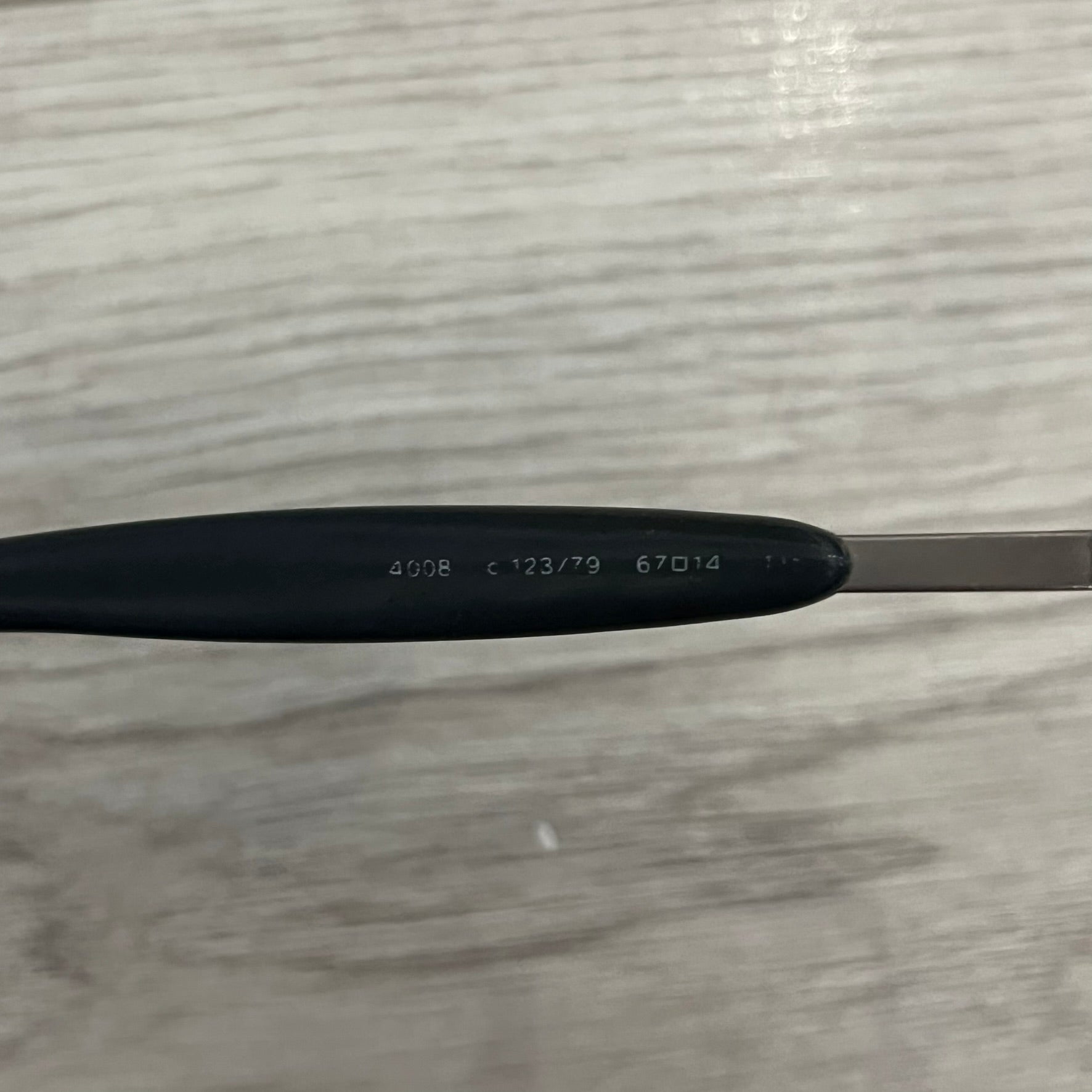 Chanel 4008 Rimless Silver Sunglasses with blue gradient lenses, combining a futuristic rimless design with vintage early 2000s style. Features CC logos on the temples, Chanel engraving on the bridge, and a silver metal frame. Made in Italy with CE certification.
