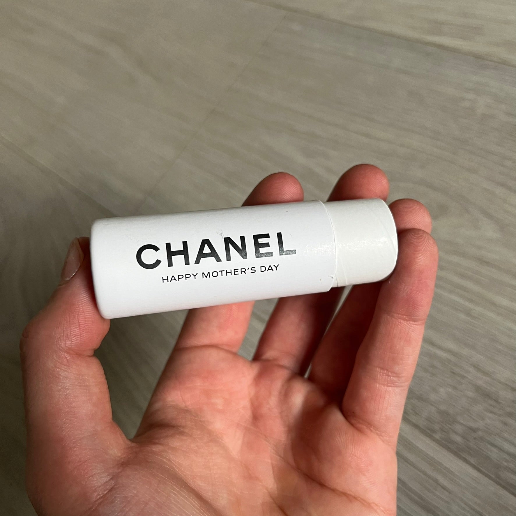 Chanel Mother’s Day Colored Pencils Set from 2021, presented in a white cylindrical tube with “Happy Mother’s Day” text and the Chanel logo on top. A Chanel Beauté complimentary gift featuring six branded colored pencils in blue, red, yellow, brown, orange, and green.
