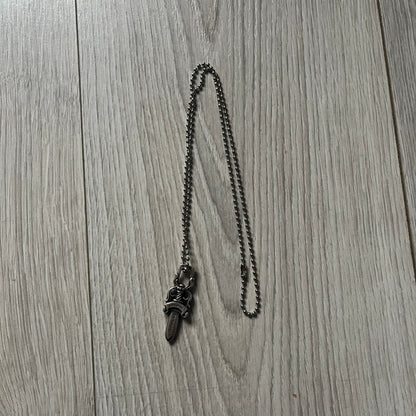 Chrome Hearts Dagger #10 Pendant crafted from genuine .925 silver, featuring the brand’s signature double-sided dagger design with “Chrome” on the guard and “Hearts” on the blade. Comes on a standard steel ball chain (non-CH). The top rectangular bail includes engraved markings: “89/03” on one side and “Sterling” on the other.