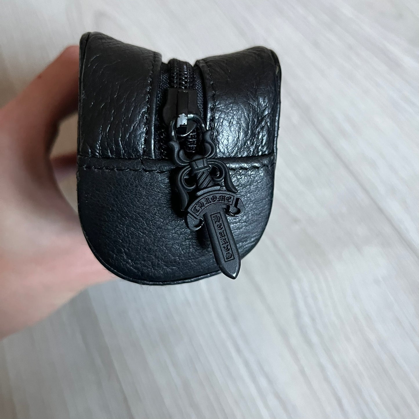 Chrome Hearts Stains Gold Sunglasses featuring a gold-tone metal frame with brown mirror-coated plastic lenses. Made in Japan, this model includes aged silver Chrome Hearts cross detailing wrapped around the arms, cut-out cross accents at the arm tips, and visible Chrome Hearts branding on the bridge and top of the frame. Additional cross branding appears on the nose pads. Comes complete with the original black leather Chrome Hearts zip case, finished with exterior branding and a dagger-shaped zipper pull.