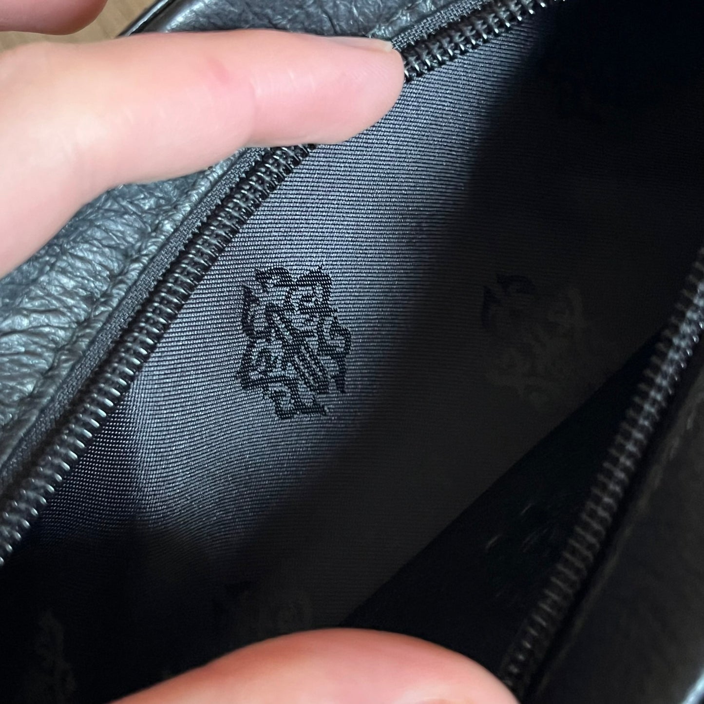 Chrome Hearts Stains Gold Sunglasses featuring a gold-tone metal frame with brown mirror-coated plastic lenses. Made in Japan, this model includes aged silver Chrome Hearts cross detailing wrapped around the arms, cut-out cross accents at the arm tips, and visible Chrome Hearts branding on the bridge and top of the frame. Additional cross branding appears on the nose pads. Comes complete with the original black leather Chrome Hearts zip case, finished with exterior branding and a dagger-shaped zipper pull.