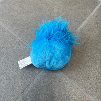 Club Penguin Series 2 Blue Puffle Plushie was Released in 2009 by Disney and Jakks Pacific, featuring a smirking embroidered face, troll-like hair and a half plush half beanie body. It comes with a Disney-licensed tag.