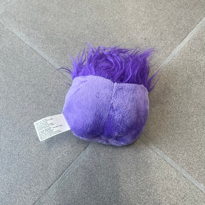 Club Penguin Series 2 Purple Puffle Plushie was Released in 2009 by Disney and Jakks Pacific, featuring a smirking looking up embroidered face, troll-like hair and a half plush half beanie body. It comes with a Disney-licensed tag.