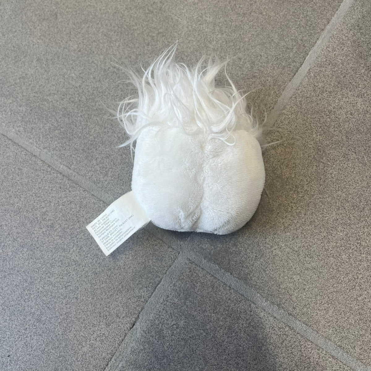 Club Penguin Series 3 White Puffle Plushie was Released in 2009 by Disney and Jakks Pacific, featuring a happy embroidered face, troll-like hair and a half plush half beanie body. It comes with a Disney-licensed tag.