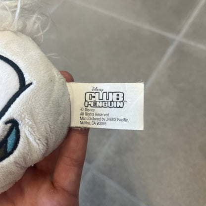 Club Penguin Series 3 White Puffle Plushie was Released in 2009 by Disney and Jakks Pacific, featuring a happy embroidered face, troll-like hair and a half plush half beanie body. It comes with a Disney-licensed tag.