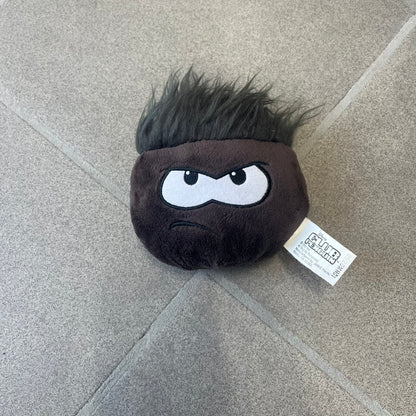 Club Penguin Series 4 Black Puffle Plushie was Released in 2009 by Disney and Jakks Pacific, featuring an angry embroidered face, troll-like hair and a half plush half beanie body. It comes with a Disney-licensed tag.