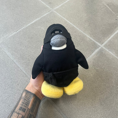 Club Penguin 2009 Series 4 Ninja Penguin Plushie is a black penguin with a black ninja outfit (top+mask) that can be taken off. Released in 2009 by Disney and Jakks Pacific, featuring an embroidered Club Penguin logo on the bottom of the foot. It comes with a Disney-licensed tag.