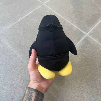 Club Penguin 2009 Series 4 Ninja Penguin Plushie is a black penguin with a black ninja outfit (top+mask) that can be taken off. Released in 2009 by Disney and Jakks Pacific, featuring an embroidered Club Penguin logo on the bottom of the foot. It comes with a Disney-licensed tag.