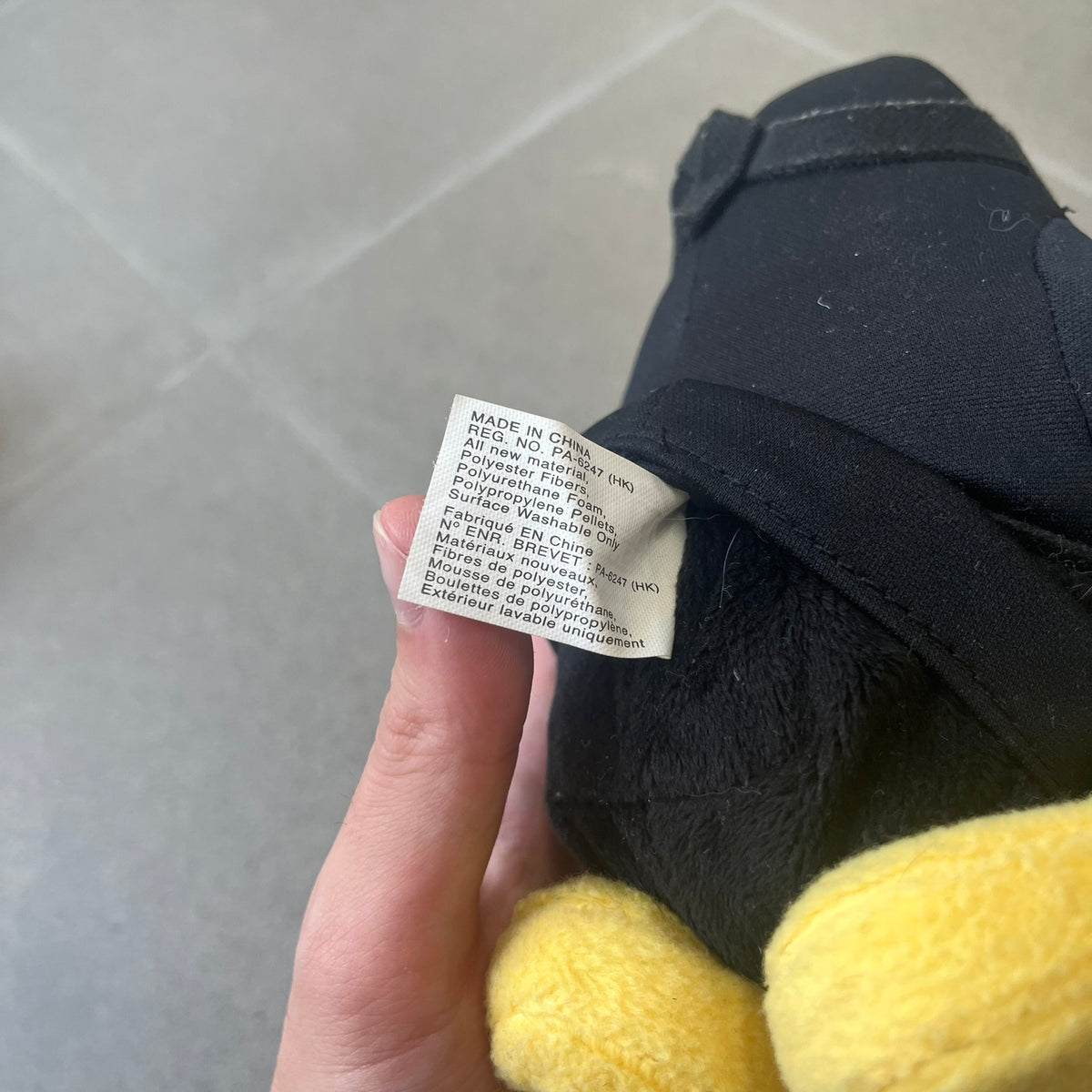Club Penguin 2009 Series 4 Ninja Penguin Plushie is a black penguin with a black ninja outfit (top+mask) that can be taken off. Released in 2009 by Disney and Jakks Pacific, featuring an embroidered Club Penguin logo on the bottom of the foot. It comes with a Disney-licensed tag.