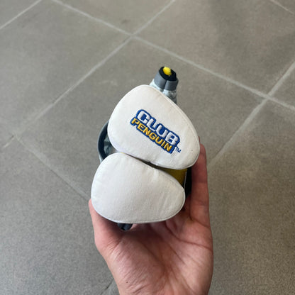 Club Penguin 2010 Series 7 Band Member Penguin Plushie is a yellow penguin with 3D Headphones and a jacket that can be taken off. Released in 2010 by Disney and Jakks Pacific, featuring an embroidered Club Penguin logo on the bottom of the foot. It comes with a Disney-licensed tag.