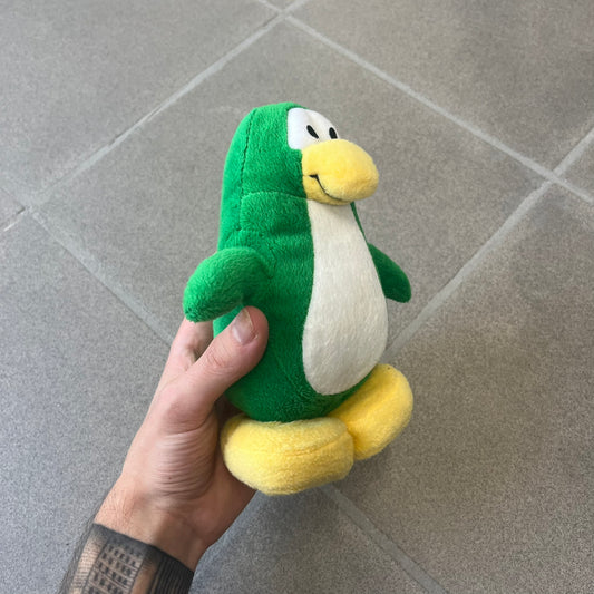 Club Penguin 2011 Series 10 Tree Penguin Plushie is a green penguin. Originally released with a christmas tree outfit, sadly it's missing. Released in 2011&nbsp; by Disney and Jakks Pacific, featuring an embroidered Club Penguin logo on the bottom of the foot. It comes with a Disney-licensed tag.