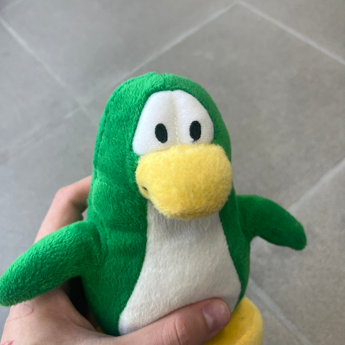 Club Penguin 2011 Series 10 Tree Penguin Plushie is a green penguin. Originally released with a christmas tree outfit, sadly it's missing. Released in 2011&nbsp; by Disney and Jakks Pacific, featuring an embroidered Club Penguin logo on the bottom of the foot. It comes with a Disney-licensed tag.