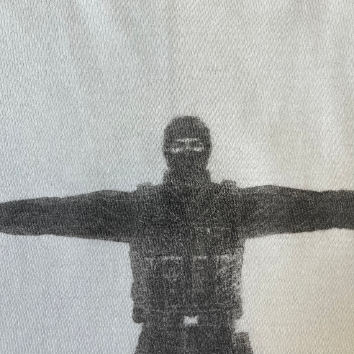 Counter Strike 1.6 Bootleg White Tee is a white, 100% cotton European bootleg made on an "American" blank, featuring a CS 1.6 counter-terrorist model standing with his arms out on the front with "Counter-Strike" text printed below.
