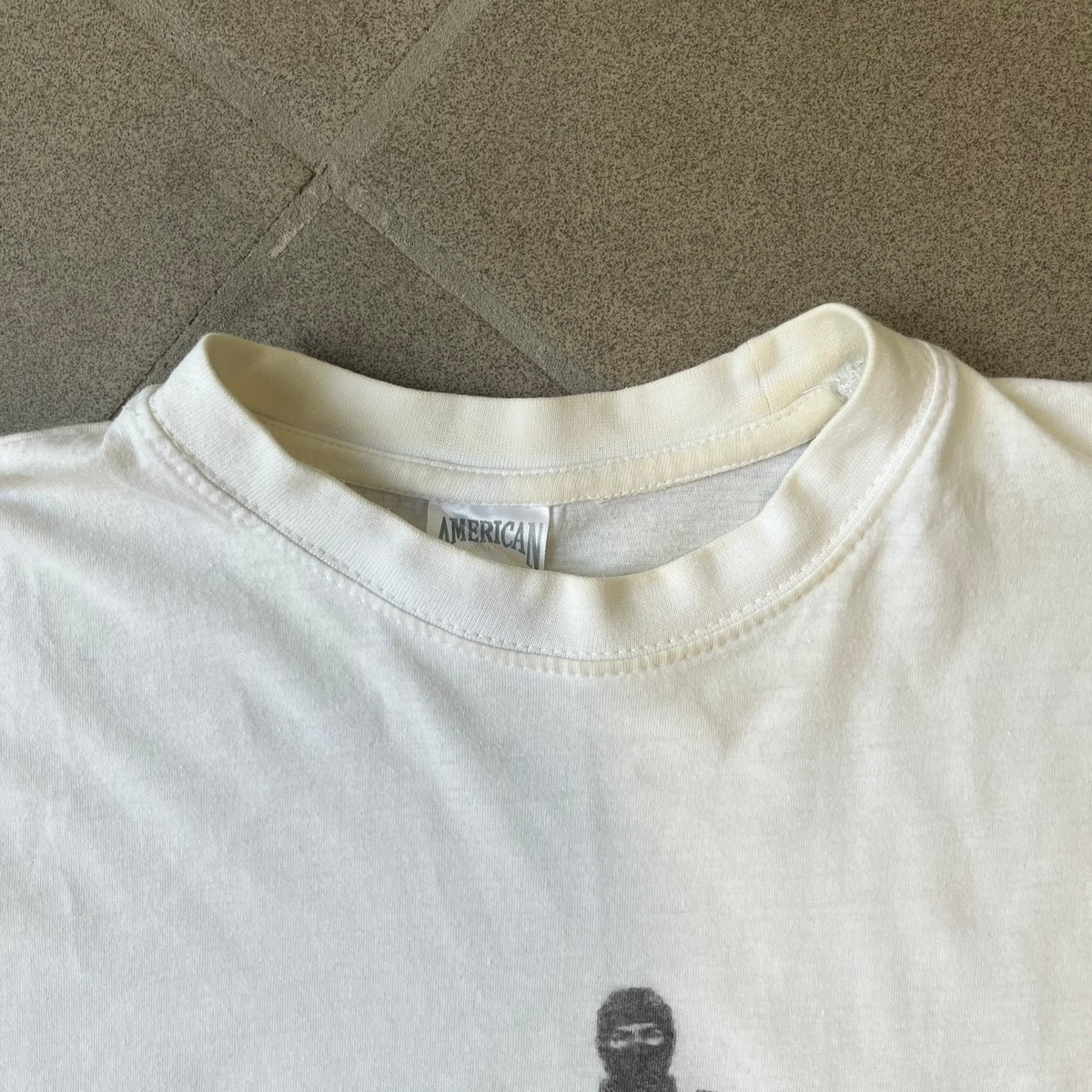 Counter Strike 1.6 Bootleg White Tee is a white, 100% cotton European bootleg made on an "American" blank, featuring a CS 1.6 counter-terrorist model standing with his arms out on the front with "Counter-Strike" text printed below.