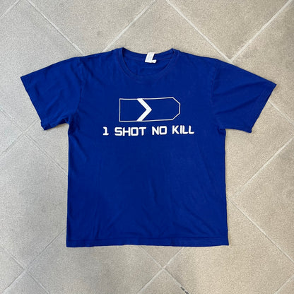 Counter Strike “1 Shot No Kill” Blue Tee features a blue T-shirt made on a Piccolio blank. The front has a Counter-Strike Silver 1 rank graphic with a white “1 Shot No Kill” text underneath. This is not an official Valve release.