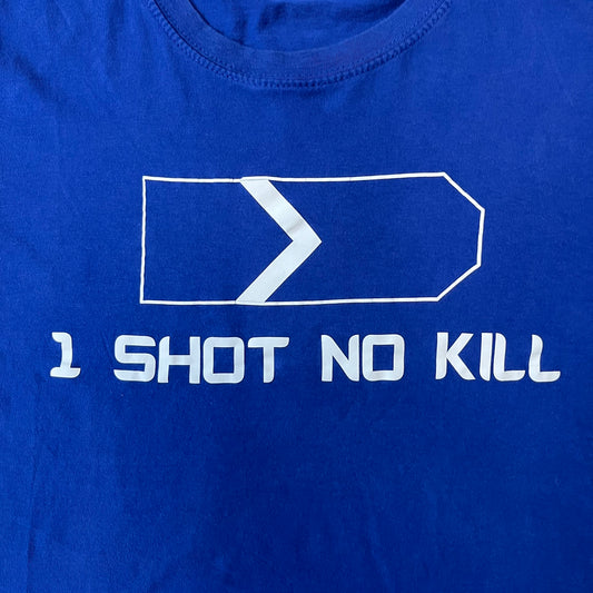 Counter Strike “1 Shot No Kill” Blue Tee features a blue T-shirt made on a Piccolio blank. The front has a Counter-Strike Silver 1 rank graphic with a white “1 Shot No Kill” text underneath. This is not an official Valve release.