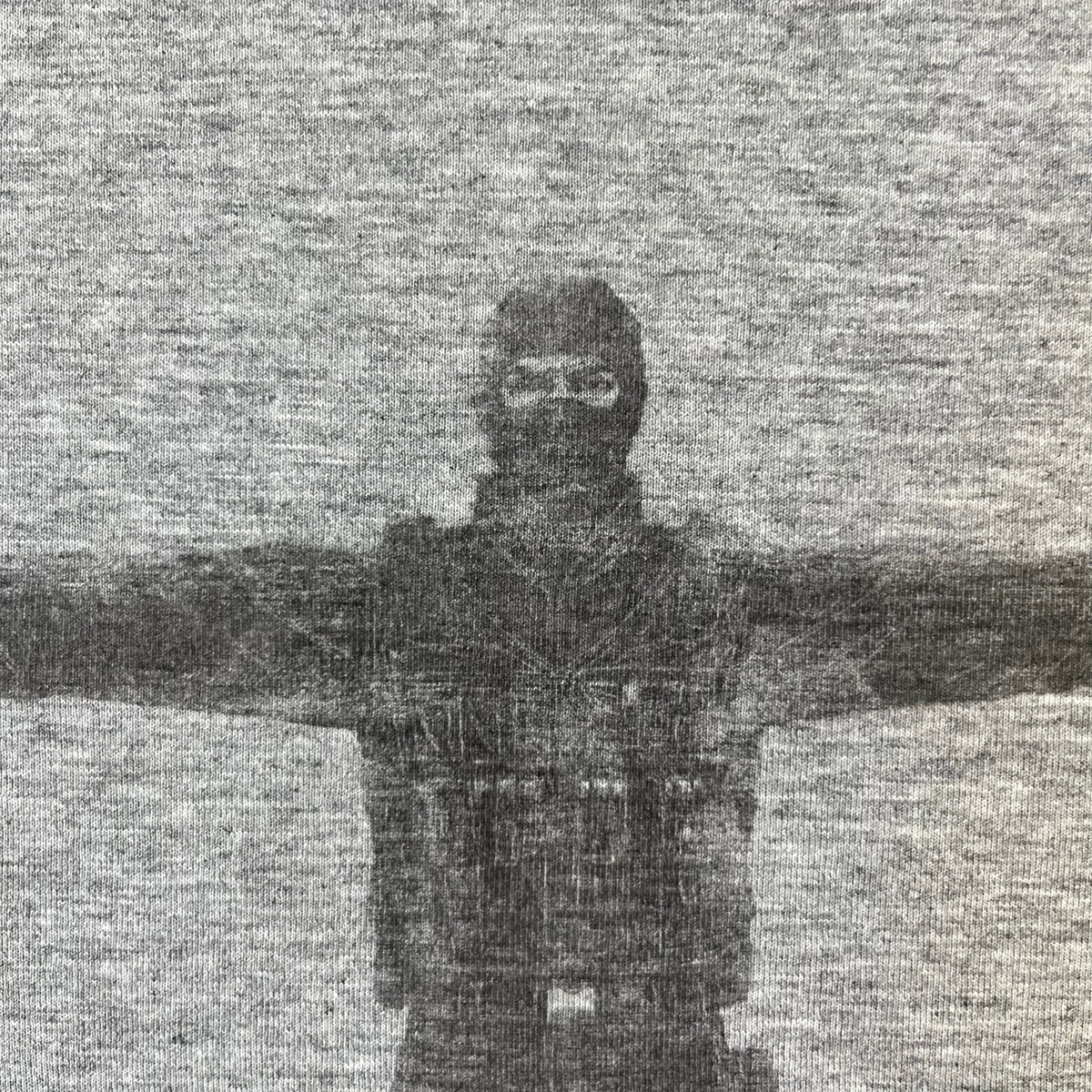 Counter Strike 2000's Bootleg Gray Tee is a gray, 100% cotton European bootleg made in Greece on an "Apple T-Shirt" blank, featuring a CS 1.6 counter-terrorist model T-posing on the front with "Counter-Strike" text printed below.
