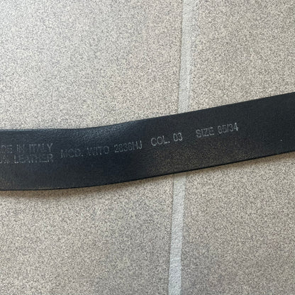 Diesel 2000s Vintage Buckle Leather Belt features a black leather strap made in Italy. The belt has a large rectangular metal buckle designed to look like a worn metal sheet, with a Diesel logo formed from small perforated holes. The buckle includes visible screws on the sides and the belt is made from 100% leather.
