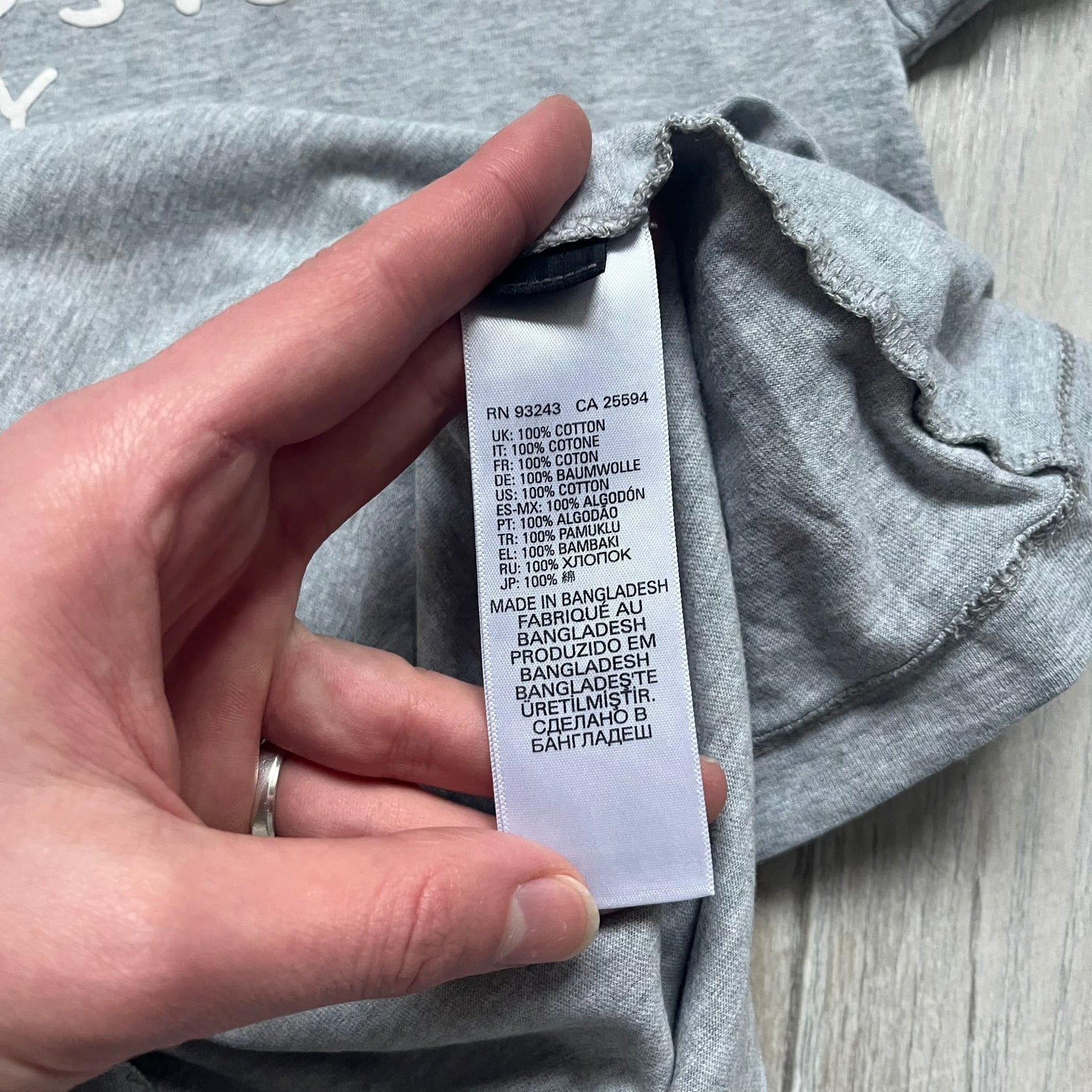 Diesel Music 1978 Gray Tee is a gray T-shirt featuring a large hand-drawn style “Diesel Music 1978” print on the front with additional text below. Made from 100% cotton, it has a crew neckline and short sleeves. The print is white, contrasting with the gray fabric.