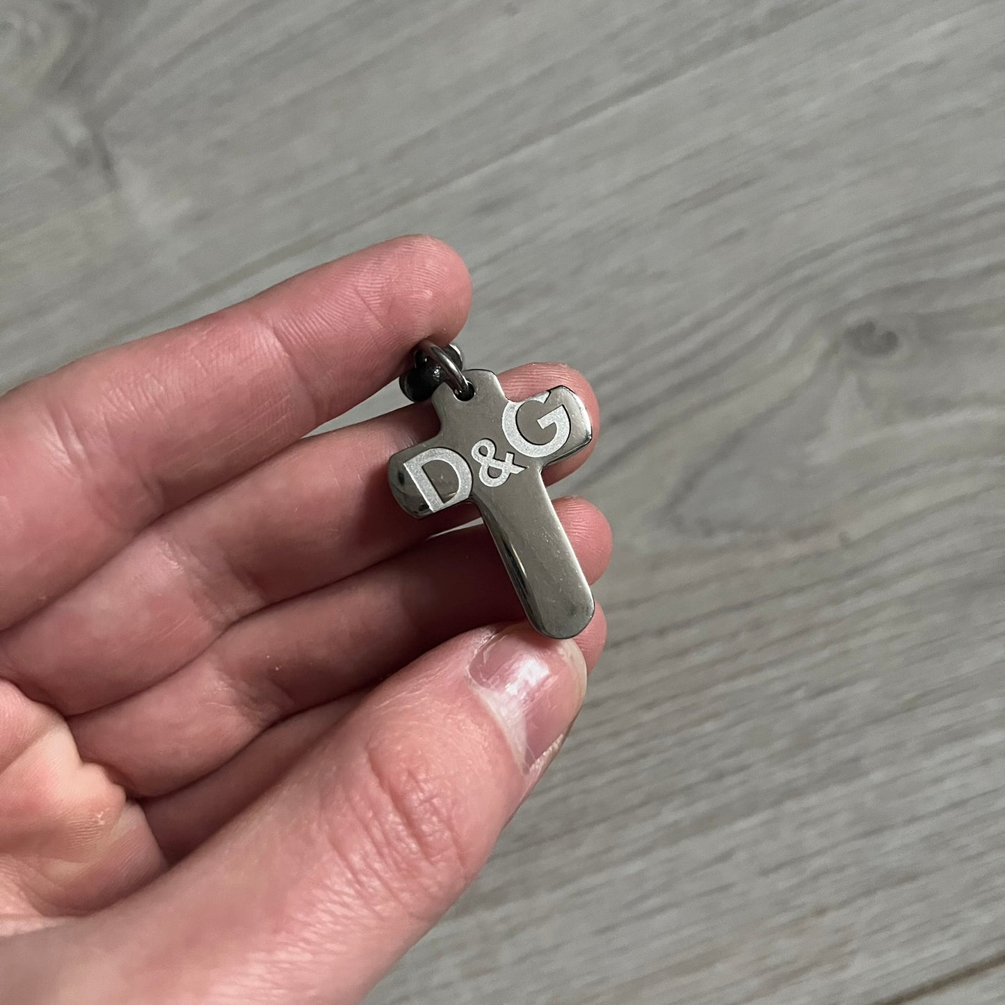 Dolce & Gabbana Pearl Brown Rosary Necklace from the 2000s era. The necklace features a silver-tone metal cross with a D&G logo, connected via a black leather link to a metal chain with alternating brown and yellow pearl-style beads. Rosary-style construction with mixed materials including metal, leather, and resin pearls. Comes complete with the original box.