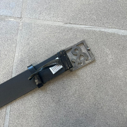  Dolce &amp; Gabbana 2000s Ampersand Black Belt features a black leather strap with a metal ampersand-shaped buckle set inside a square outline. Made in Italy. 
