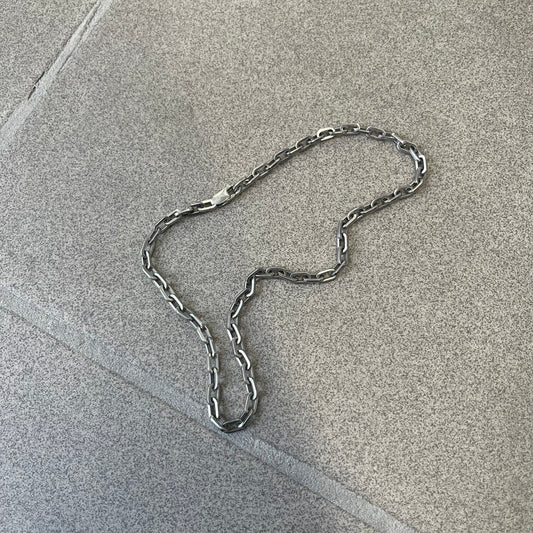 Dolce & Gabbana 2000's Basic Chain Necklace is a stainless steel paperclip chain made in Italy, featuring a clasp engraved with the D&G logo.