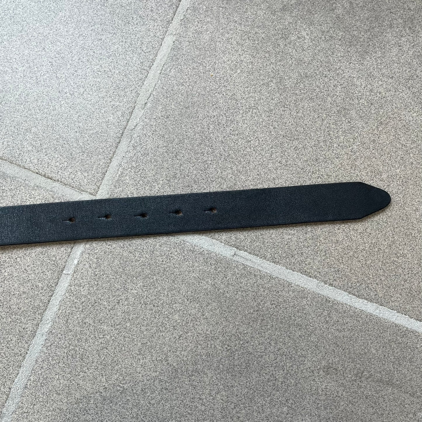 Dolce &amp; Gabbana 2000s Black Crystal Buckle Belt features a black leather strap with a stainless steel D&amp;G logo buckle. The buckle has a decorative italic-style font and is fully covered with crystal/rhinestone detailing on the front. Made in Italy.