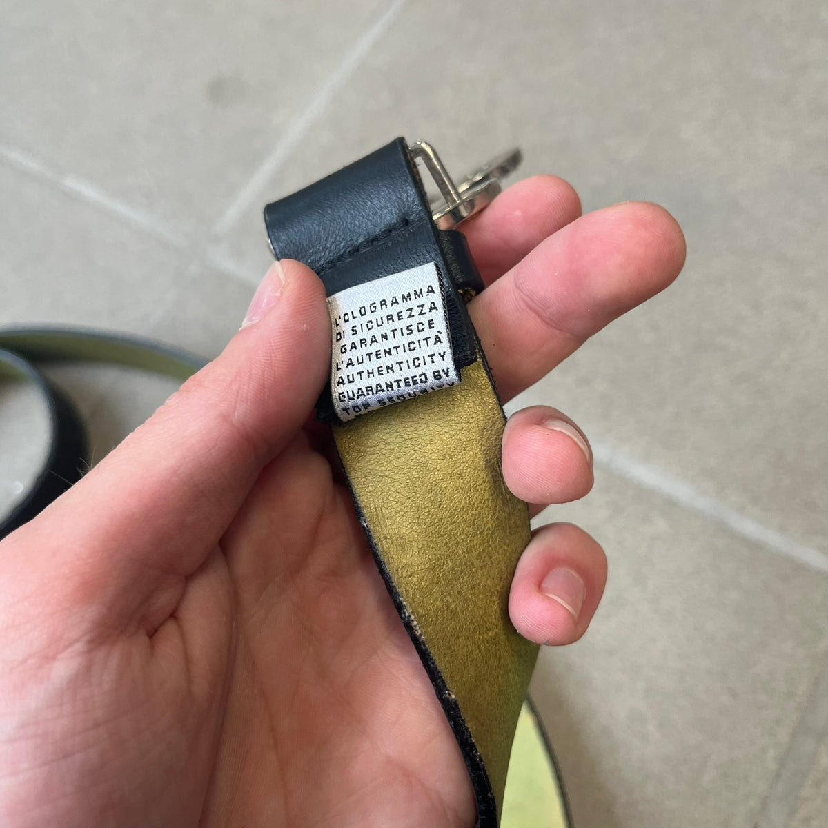 Dolce &amp; Gabbana 2000s Black Crystal Buckle Belt features a black leather strap with a stainless steel D&amp;G logo buckle. The buckle has a decorative italic-style font and is fully covered with crystal/rhinestone detailing on the front. Made in Italy.