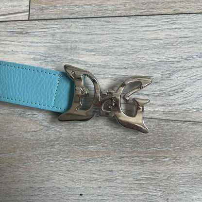 Dolce &amp; Gabbana 2008 Butterfly Buckle Baby Blue Leather Belt from the AW2008 collection. Crafted from smooth Baby Blue leather with visible edge stitching, this belt features a big silver-tone D&amp;G logo buckle shaped in a butterfly-style form. The buckle has a polished metal finish, while the belt itself is made from 100% leather and retains a clean, structured profile. An original seasonal accessory from Dolce &amp; Gabbana’s AW2008 season.