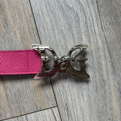 Dolce &amp; Gabbana 2008 Butterfly Buckle Pink Leather Belt from the AW2008 collection. Crafted from smooth pink leather with visible edge stitching, this belt features a big silver-tone D&amp;G logo buckle shaped in a butterfly-style form. The buckle has a polished metal finish, while the belt itself is made from 100% leather and retains a clean, structured profile. An original seasonal accessory from Dolce &amp; Gabbana’s AW2008 season.