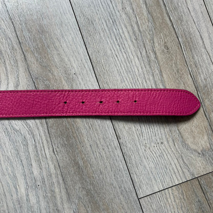 Dolce &amp; Gabbana 2008 Butterfly Buckle Pink Leather Belt from the AW2008 collection. Crafted from smooth pink leather with visible edge stitching, this belt features a big silver-tone D&amp;G logo buckle shaped in a butterfly-style form. The buckle has a polished metal finish, while the belt itself is made from 100% leather and retains a clean, structured profile. An original seasonal accessory from Dolce &amp; Gabbana’s AW2008 season.