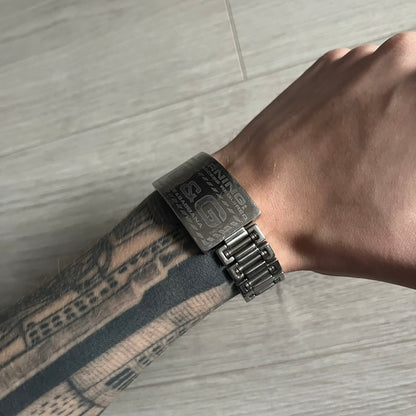 Dolce & Gabbana Warning Stainless Steel Bracelet. From the Spring/Summer 2006 collection, this bracelet features a polished stainless steel design with a clip closure. The front plate displays “Warning Special Access Required” alongside D&G Dolce & Gabbana branding.