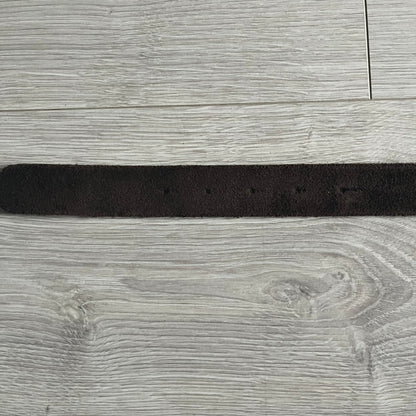 Dolce & Gabbana Black Enamel Belt featuring a D&G logo buckle in black enamel with gold-tone outline. Crafted from brown leather with a gold-tone interior, this belt combines sleek design with subtle luxury detailing.