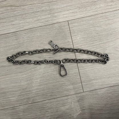 Dolce &amp; Gabbana Carabiner Chain Necklace features a robust stainless steel chain with a central carabiner engraved with the D&amp;G logo. The adjustable design includes a bolt-style clasp to modify the length, and the opposite end showcases a three-dimensional D&amp;G logo, blending industrial detailing with high-fashion appeal.