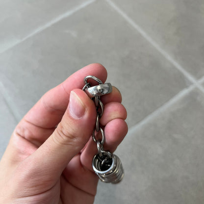 Dolce &amp; Gabbana DJ0777 Crystal Ring Link Bracelet features a stainless steel chain with freely moving rings, including basic loops, D&amp;G-engraved rings and crystal-set rings. The bracelet has a large clasp, while the end is finished with a ball featuring D&amp;G logos all around it.