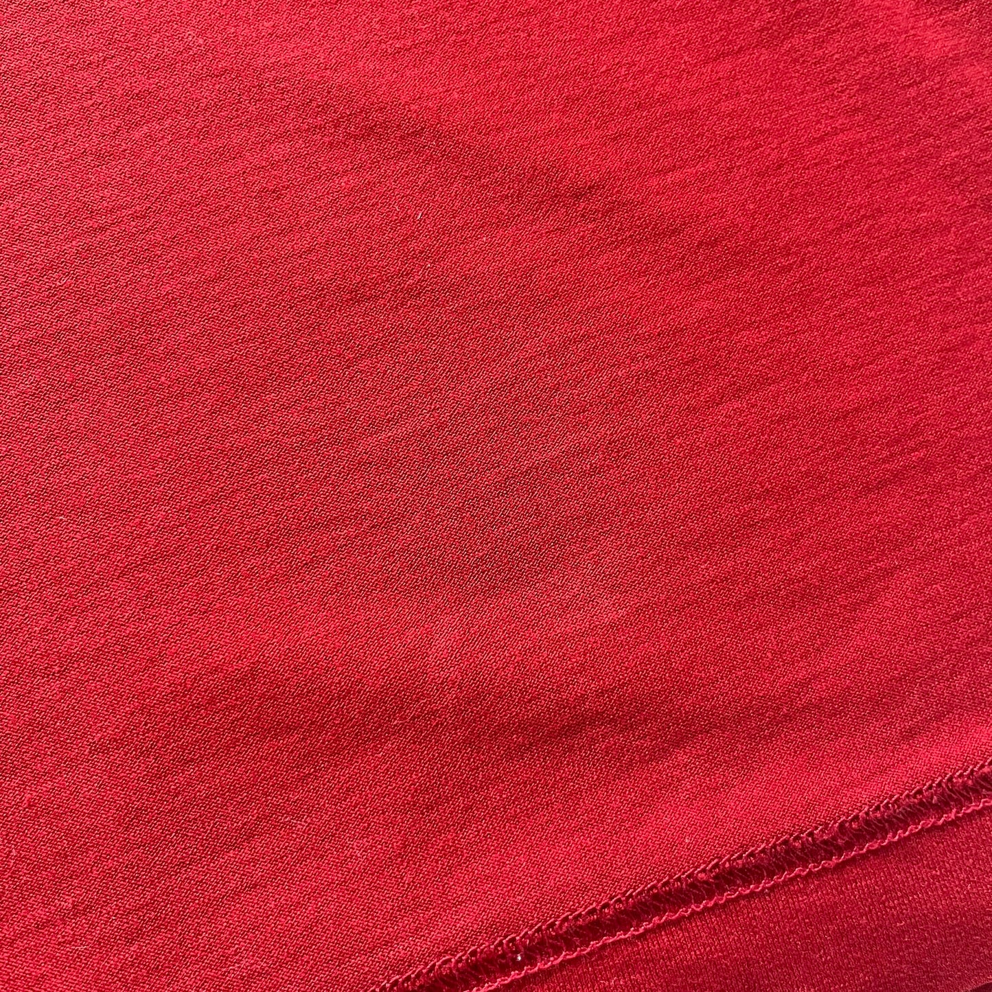 Dolce &amp; Gabbana Fall 2011 tee in vibrant red featuring a simple “Drink Coca-Cola” logo on the chest. Designed with an inside-out stitching aesthetic and a subtle back logo under the collar. A unique, collectible tee that merges casual branding with high-fashion flair.