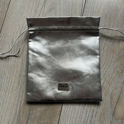 Dolce &amp; Gabbana Pearl Brown Rosary Necklace from the 2000s era. The necklace features a silver-tone metal cross with a D&amp;G logo, connected via a black leather link to a metal chain with alternating brown and yellow pearl-style beads. Rosary-style construction with mixed materials including metal, leather, and resin pearls. Comes complete with the big dustbag.