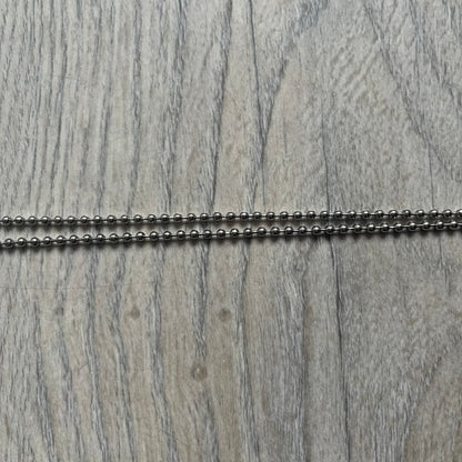 Dolce &amp; Gabbana plain logo dog tag necklace in silver-tone stainless steel, featuring the iconic D&amp;G logo engraved on a sleek tag. Suspended on a classic ball chain with a regulated size. A versatile accessory that combines minimal branding with everyday wearability.